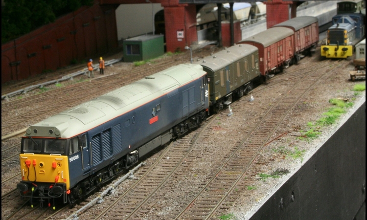 50008 "Thunderer" hauls a departmental train.